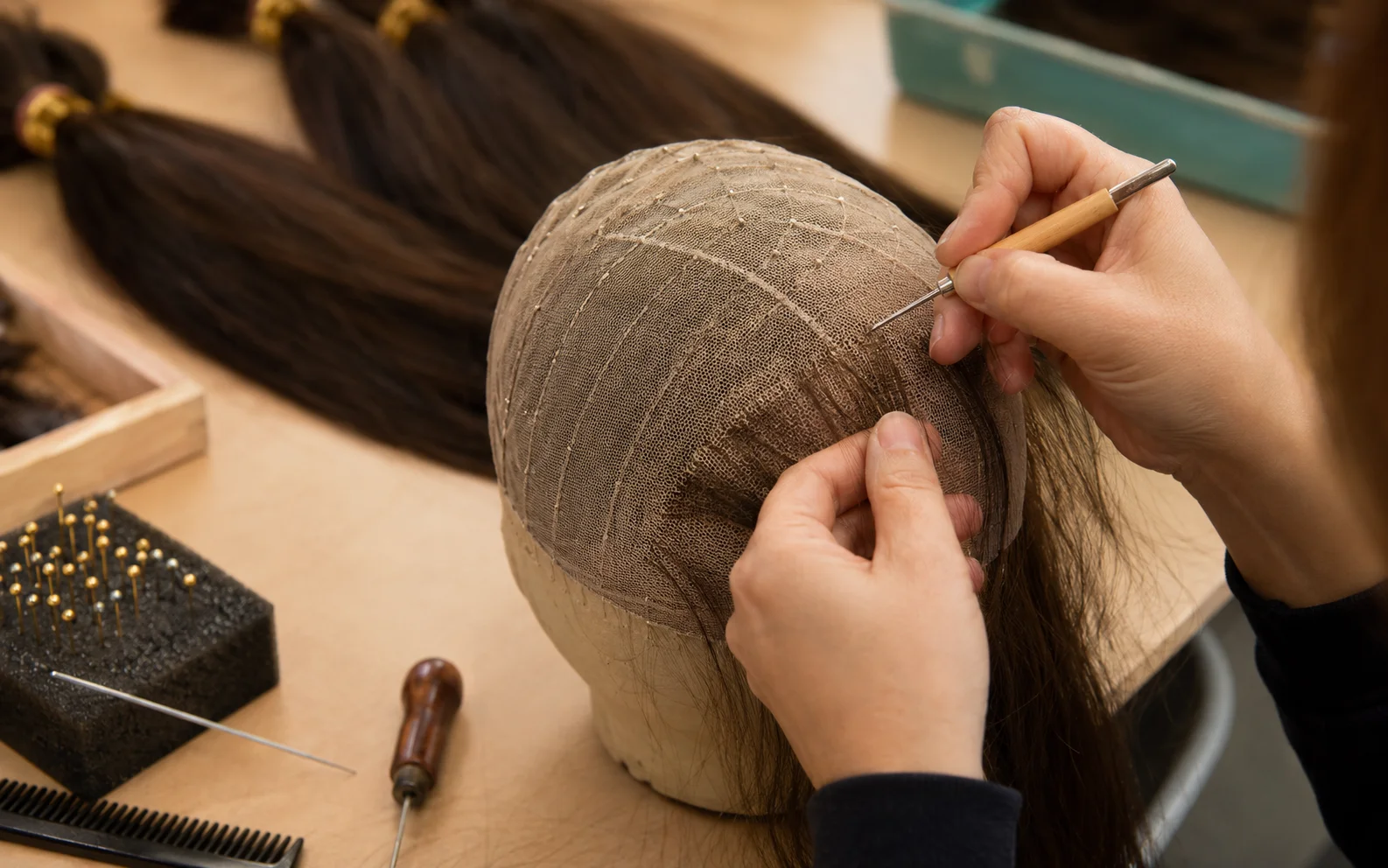 Sheitel price breakdown showing cost components: hair sourcing 35%, cap construction 20%, skilled labor 40%, certification 5%