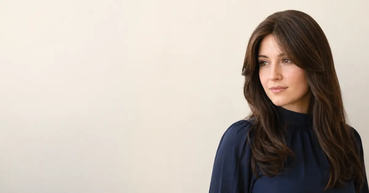 Hasidic Jewish woman wearing a traditional sheitel wig, demonstrating community hair covering standards and modesty practices