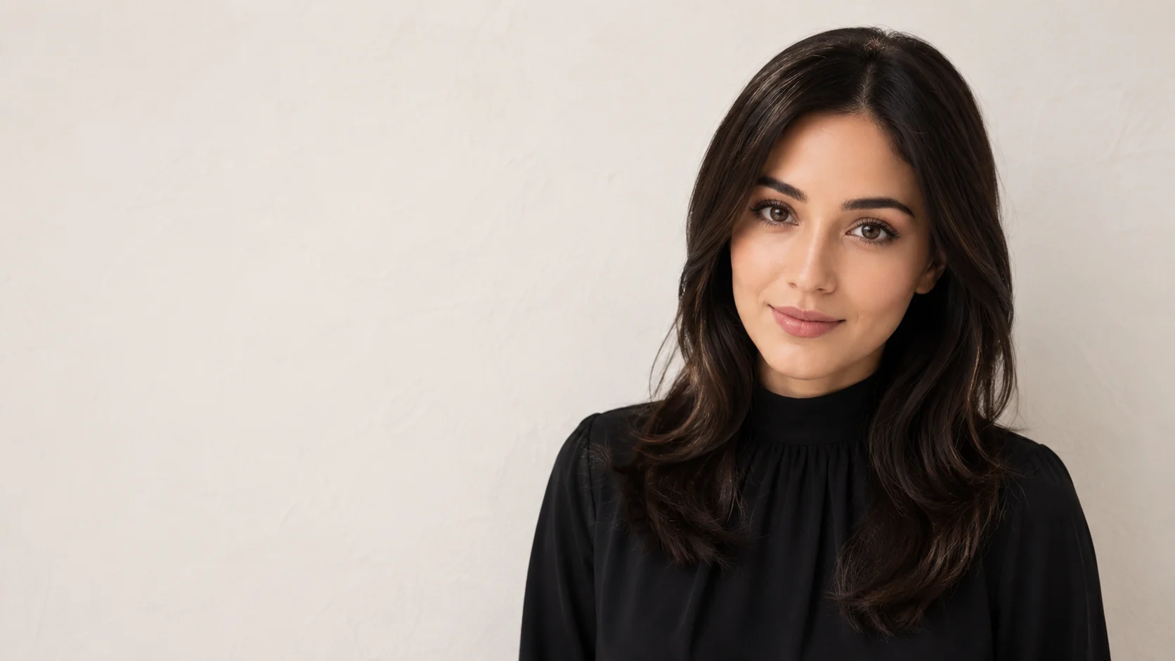 Woman wearing a natural dark brunette kosher sheitel by LEV Wigs