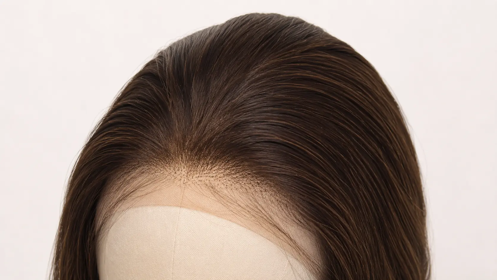 Close view of the lace front edge and hairline placement on a brunette sheitel